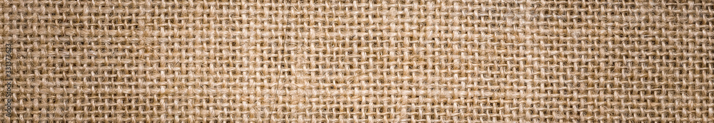 Rough hessian background with flecks of varying colors of beige and brown. with copy space. office desk concept, Hessian sackcloth burlap woven texture background. Rough hessian background with flecks of varying colors of beige and brown. with copy space. office desk concept, Hessian sackcloth burlap woven texture background.