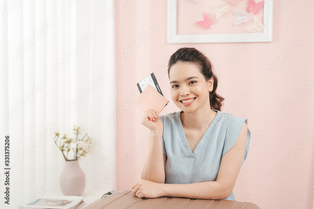 Young woman is preparing for travel at home. Young woman is preparing for travel at home.