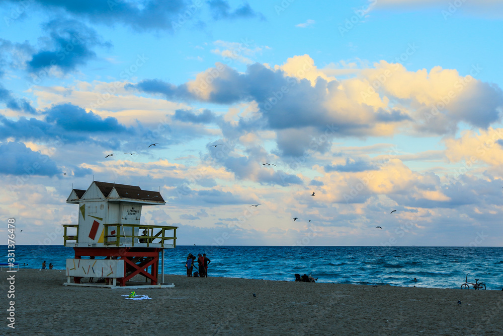 Miami, USA - October 25, 2019: Life Guard Station on the Sandy Beach Miami, USA - October 25, 2019: Life Guard Station on the Sandy Beach