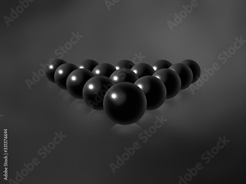 Black billiard balls on a black gradient textured background