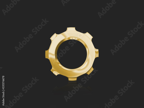 Gold gear on a dark gray smooth background