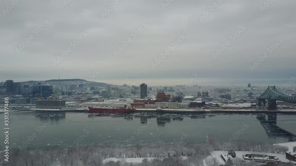 Wide angle aerial rotation montreal under the snow from above Wide angle aerial rotation montreal under the snow from above