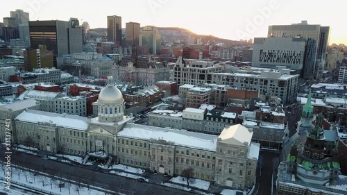 aerial stable bonsecours market under the snow montreal skyline photo