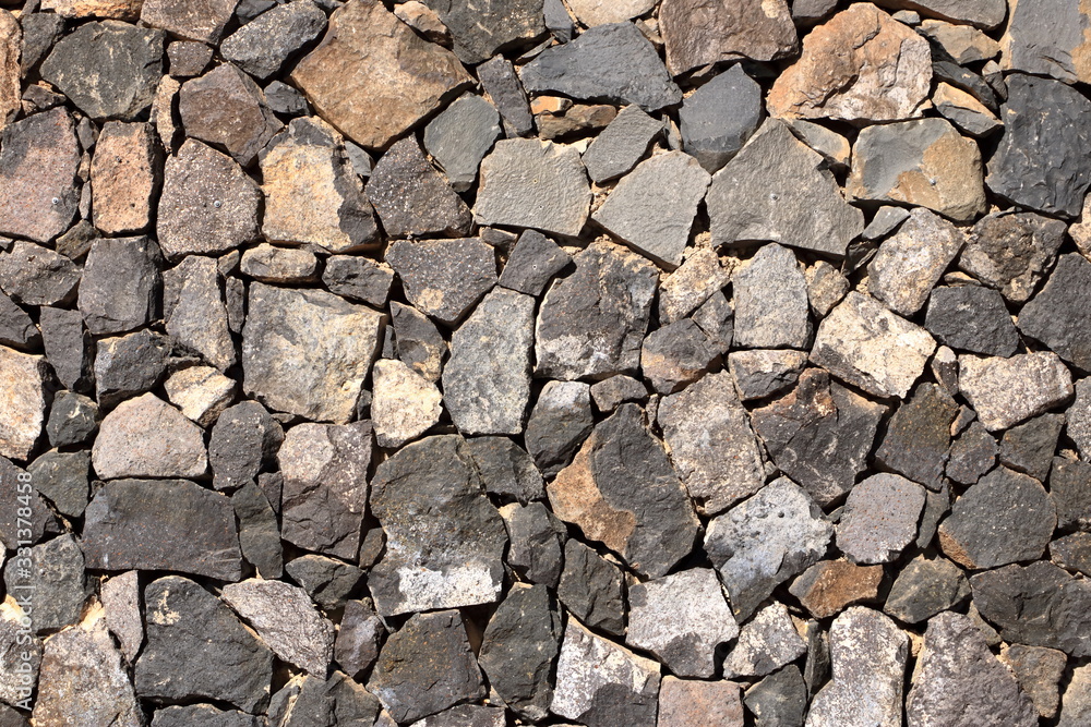 Texture of a grey granite stone wall for background Texture of a grey granite stone wall for background