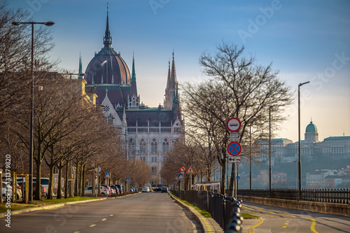 Budapest, Hungary - Beautiful Parliament building of Hungary and Buda Castle Royal Palace at sunset with totally empty streets and and no walking people during the Coronavirus 2019 disease