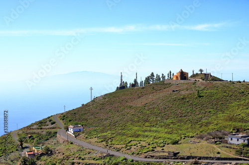 Monument of whistling language at the overlook Mirador de Igualero and the church Iglesia de San Francisco in the highland of La Gomera, Canary Islands, Spain photo