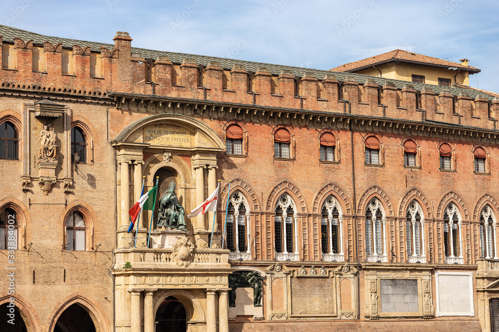 Bologna city hall, ancient Accursio palace, XIII century, with the statue of Pope Gregorio XIII and the Virgin Mary. Emilia-Romagna, Italy, Europe