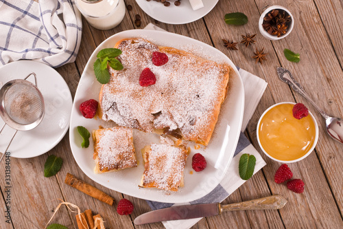 Bougatsa - Greek puff pastry with cream. photo