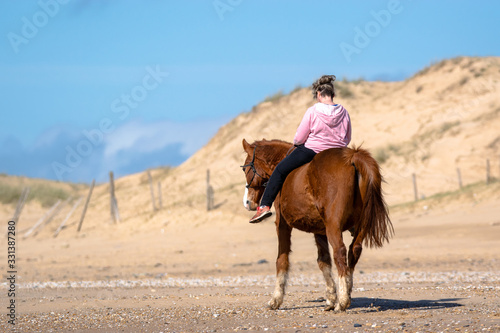 Horse ride on the beach FRANCE.
