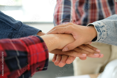 startup man woman joining united hand, business team touching hands together. unity teamwork partnership concept.