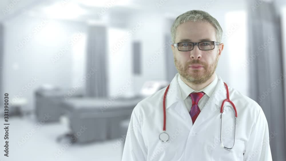 Portrait of a confident doctor in the modern hospital ward. Shot on Red camera Portrait of a confident doctor in the modern hospital ward. Shot on Red camera