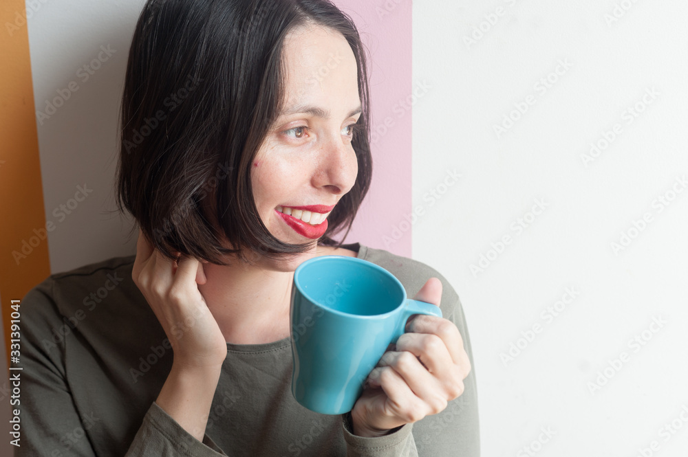 young peaceful happy woman drinking a beverage young peaceful happy woman drinking a beverage