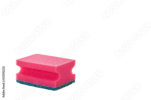 Red foam sponge for washing dishes closeup on a white background.
