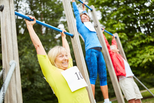 Senior group during chin-up workout