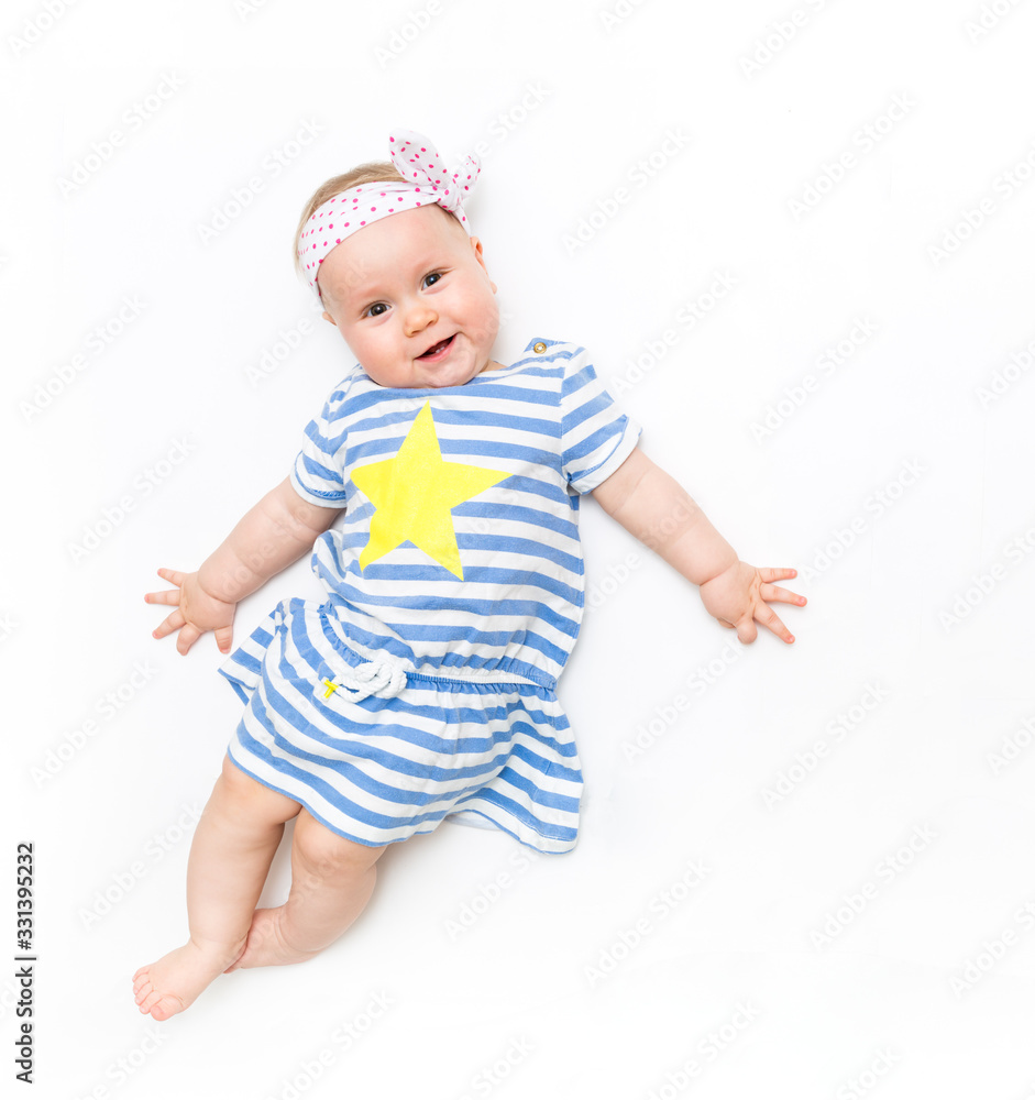 Portrait of a sweet infant baby girl wearing a pink dress and headband bow, isolated on white in studio Portrait of a sweet infant baby girl wearing a pink dress and headband bow, isolated on white in studio