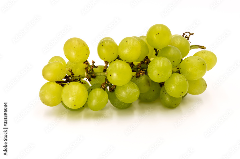 Green grapes isolated on white.