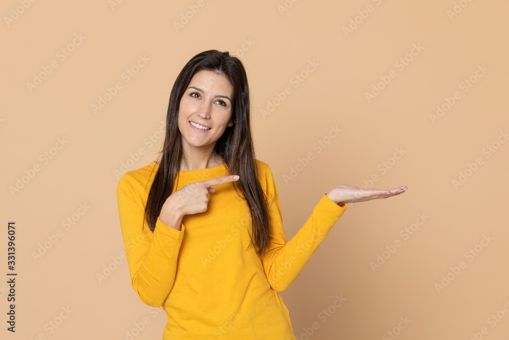 Attractive young girl wearing a yellow T-shirt Attractive young girl wearing a yellow T-shirt
