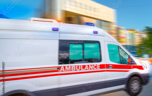 Ambulance in the city on a blurred background