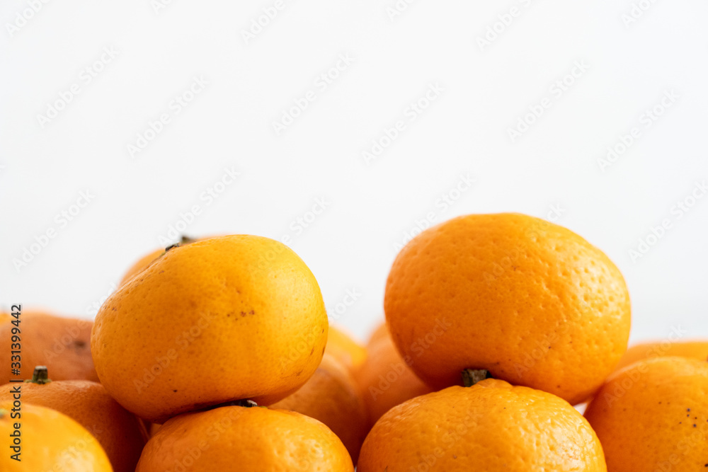multiple orange on white marble surface. Concept for fruit nutrition and diet food. multiple orange on white marble surface. Concept for fruit nutrition and diet food.