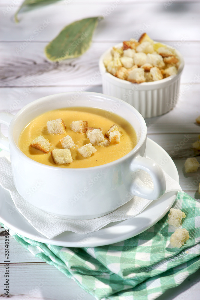 cream cheese soup with crackers on a light background cream cheese soup with crackers on a light background
