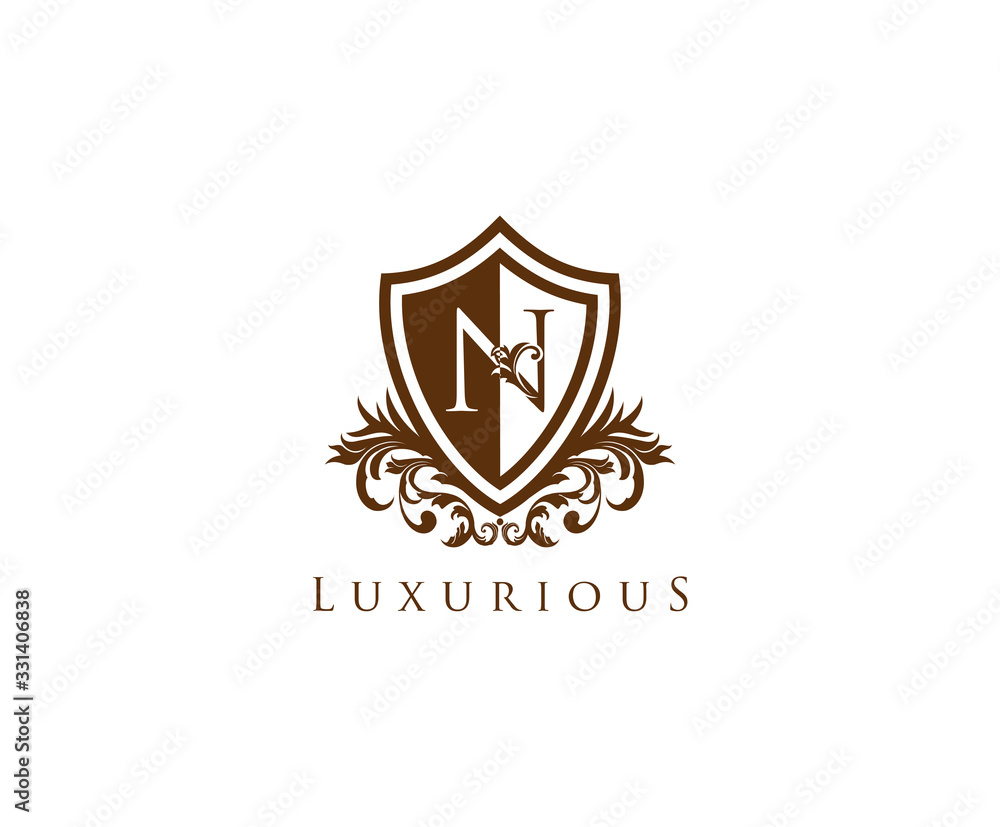 Obraz premium Vintage Letter N Logo. Shield N Letter Design Vector with shield shaper and Floral Hand Drawn.