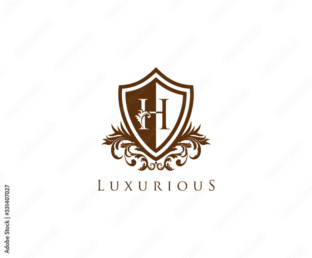 Fototapeta premium Vintage Letter H Logo. Shield H Letter Design Vector with shield shaper and Floral Hand Drawn.