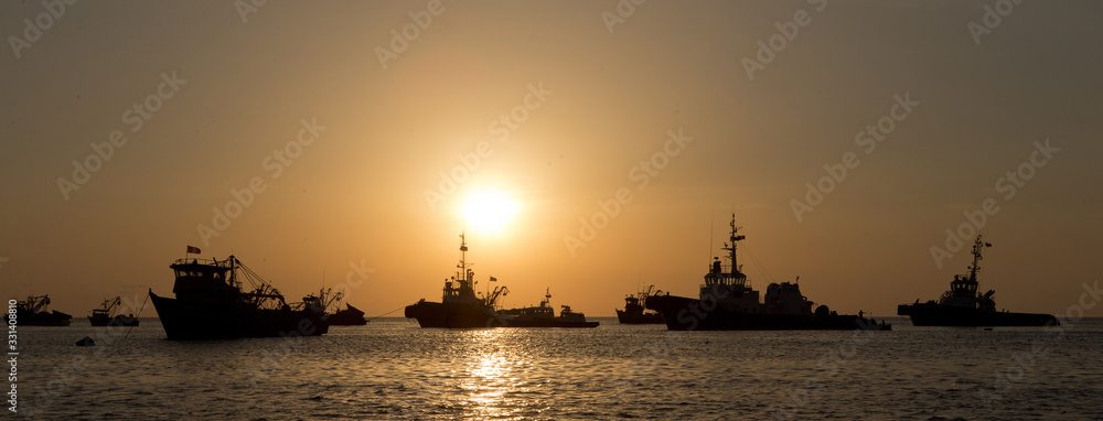 Sunset harbour Illo Peru. Fishingboats Sunset harbour Illo Peru. Fishingboats
