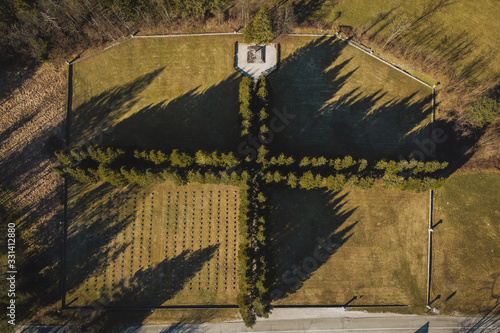 Bild auf Leinwand Aerial view of a military cemetery in the valley of Soca