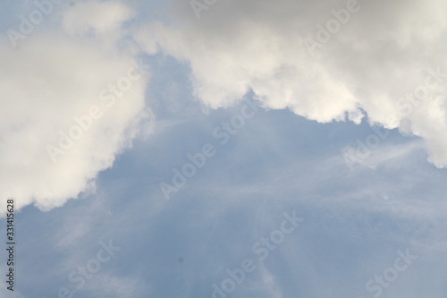 Fototapeta Naklejka Na Ścianę i Meble -  white clouds against a blue sky