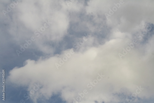 white clouds against a blue sky