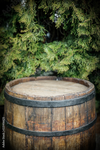Old wooden barrel in garden and free space for your decoration.  © magdal3na