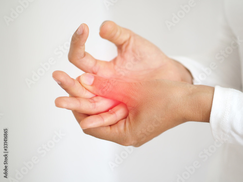 Quadro em tela rheumatoid arthritis and repetitive motion injuries,including carpal tunnel syndrome in woman and she touching on her wrist and symptoms of pain and swelling in the hand use for health care concept