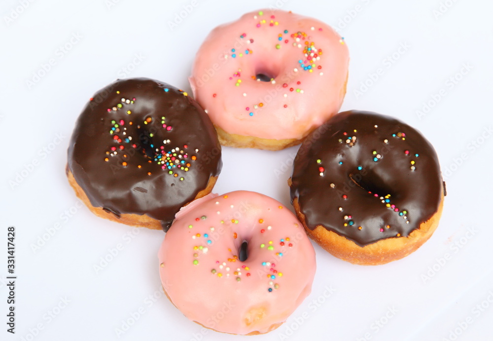 Delicious Donut with Sprinkles Isolated on White Background