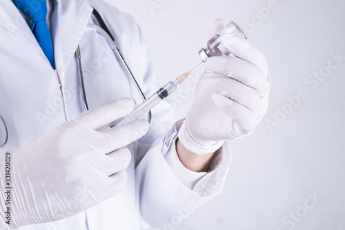 COVID-19, nCoV 2019 or Corona Virus 2019.Corona virus concept and syringe vaccine background, White background, World health texture