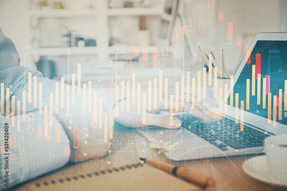 Multi exposure of stock market chart with man working on computer on background. Concept of financial analysis. Multi exposure of stock market chart with man working on computer on background. Concept of financial analysis.