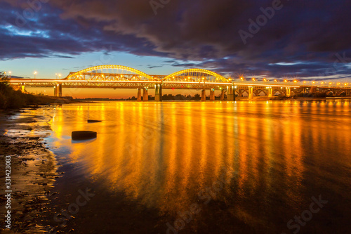 Golden illumination of the bridge in Nizhny Novgorod