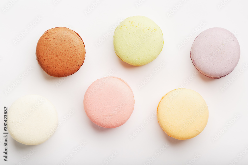 Macaroni cookies of different colors on a white background, isolate. Macaroni cookies of different colors on a white background, isolate.