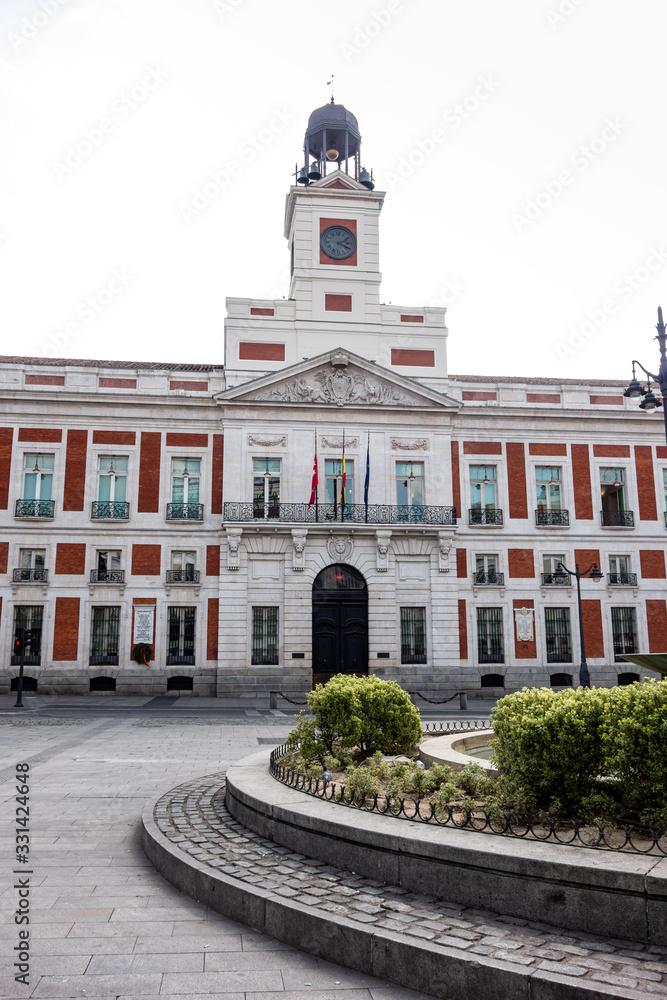 Puerta del Sol square, seat of government of the community of Madrid with no people around due to the state of alarm and the confinement decreed because of Covid-19