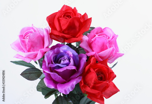 Red  pink and purple colorful textile rose closeup