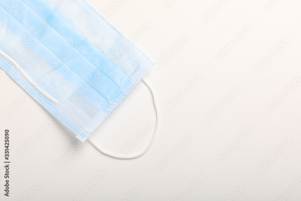 Medical mask for protection against flu and corona virus on white background Medical mask for protection against flu and corona virus on white background