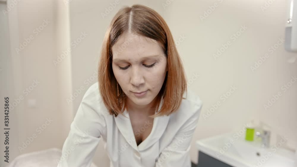 Massage - massage therapist is kneading all sides of the client Massage - massage therapist is kneading all sides of the client