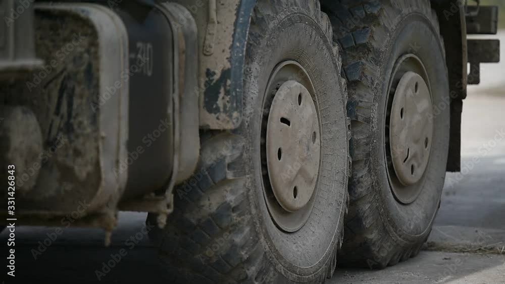 Army truck detail full of mud and sand during military exercise Army truck detail full of mud and sand during military exercise