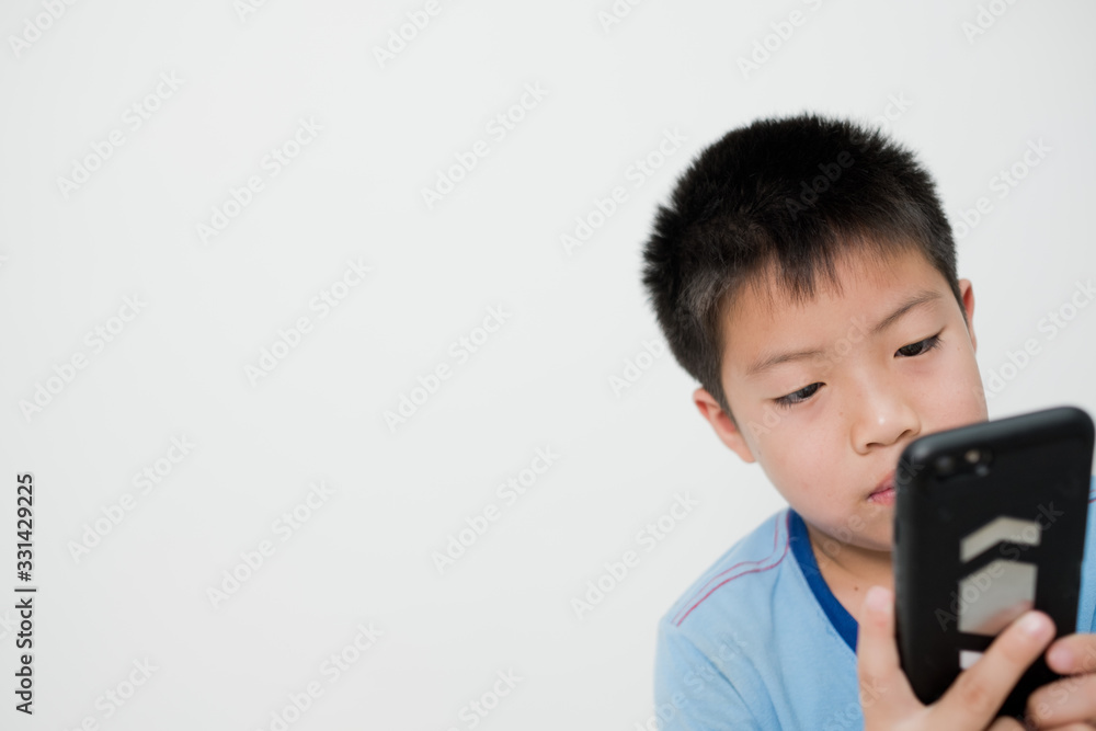 asian chinese boy playing smartphone on bed, kid use phone and play game, addicted game and cartoon,
asian chinese boy playing smartphone on bed, kid use phone and play game, addicted game and cartoon,