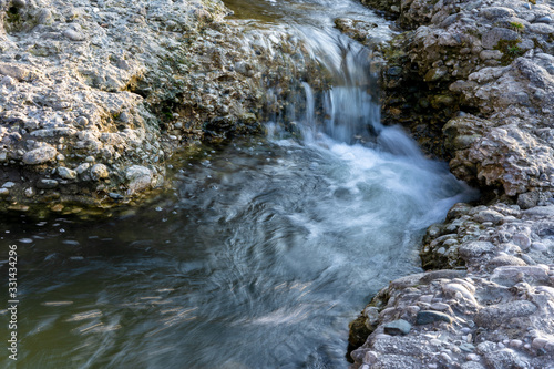 Mountain clean river with a rapid flow