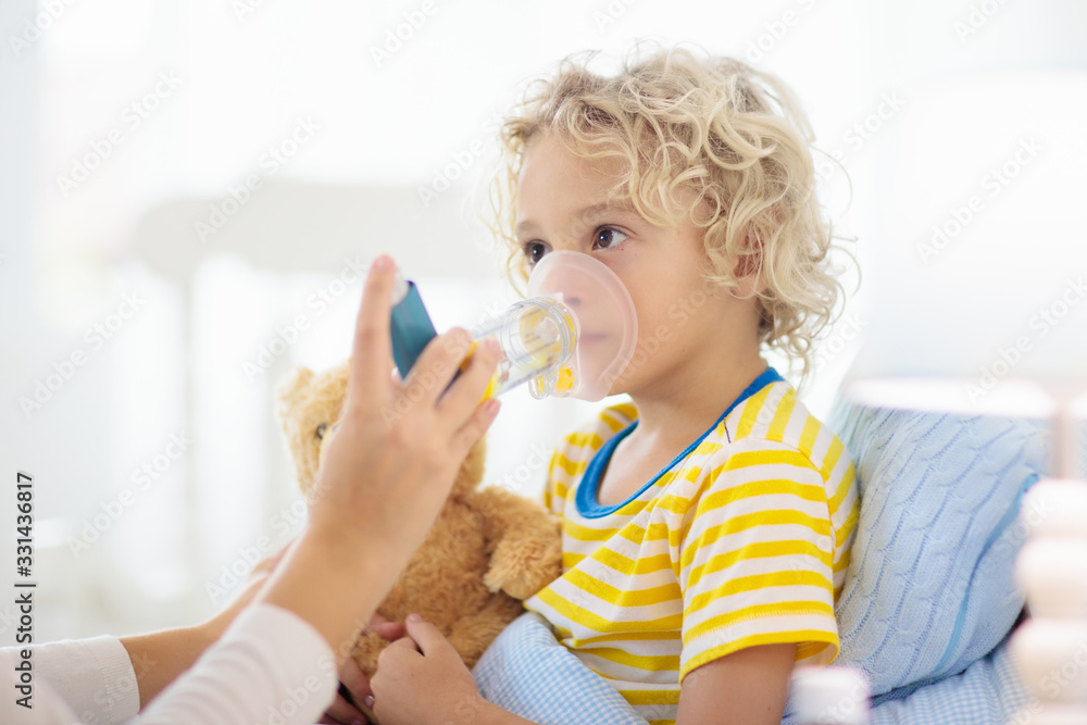 Sick little boy with asthma medicine. Ill child. Sick little boy with asthma medicine. Ill child.