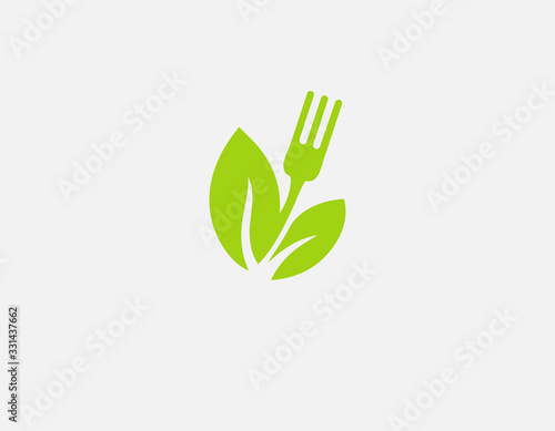 Green creative logo icon fork in the image of a flower with leaves for the dining room or cafe of your company