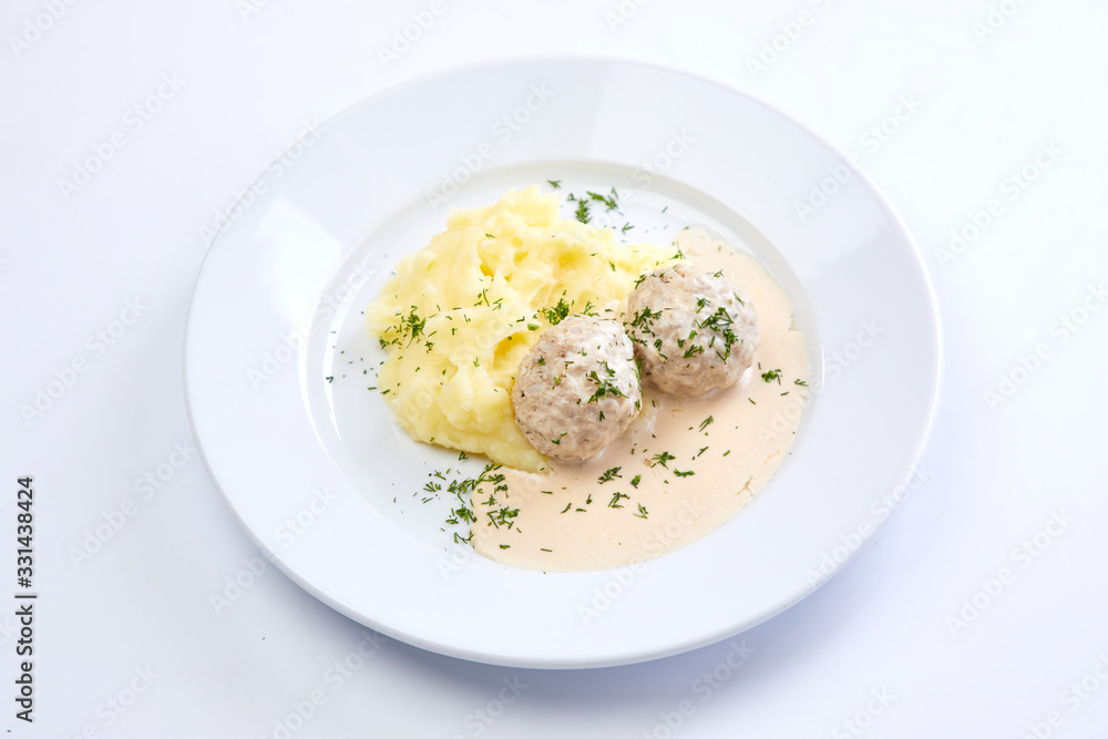 meatballs with mashed potato on the white plate meatballs with mashed potato on the white plate