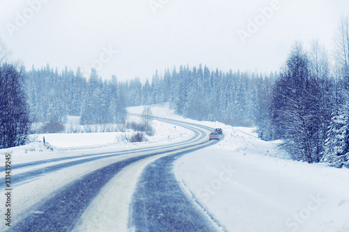 Car in snowy road in winter Rovaniemi