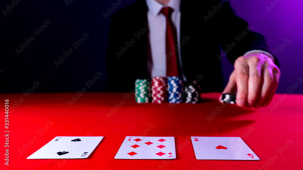 man is sitting at the poker table. poker game. man is sitting at the poker table. poker game.