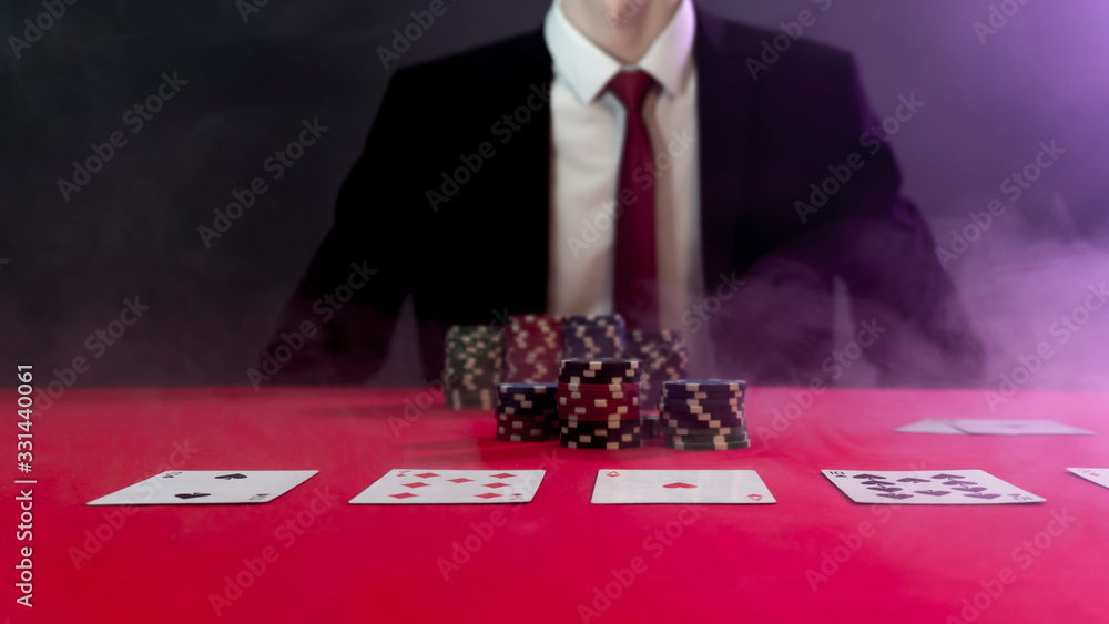 man is sitting at the poker table. poker game. man is sitting at the poker table. poker game.